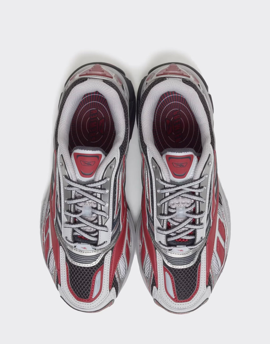 Reebok Premier Road Ultra "Red Metallic" (parfois issues de la ligne haut de gamme Reebok LTD ou de collaborations spécifiques).