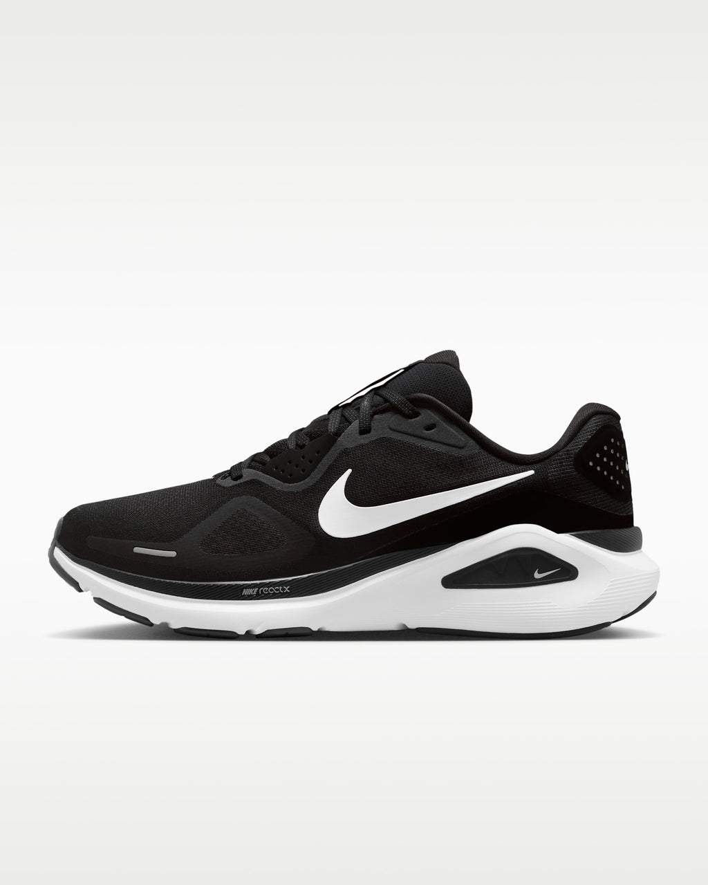 Nike Structure 26, une chaussure de running sur route réputée pour sa stabilité modérée et son confort quotidien.