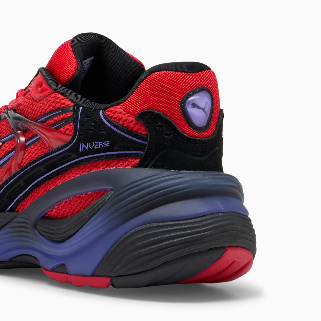 Puma Inverse Rev (référence style 402380-01), décliné dans le coloris PUMA Red / Dark Amethyst / PUMA Black