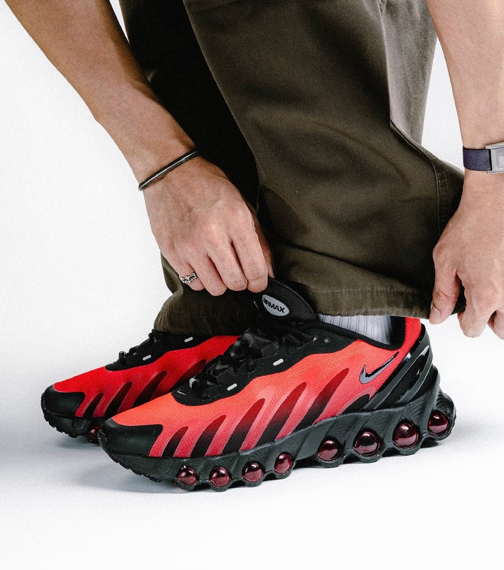 Nike Air Max Dn8, ici présentée dans son coloris iconique "Bred" (Black/Gym Red/Bright Crimson).